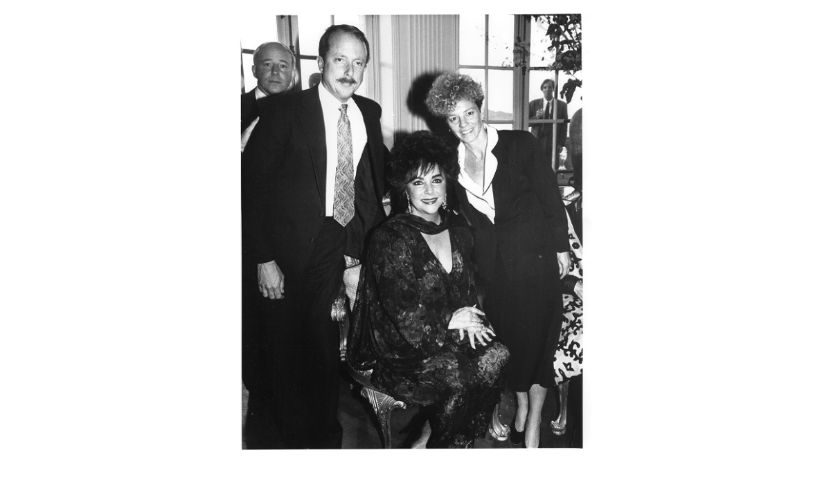 Elizabeth Taylor with CEO Tim Wolfred and Carole Midgen