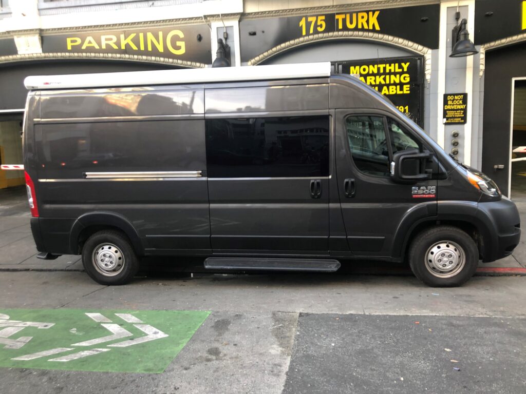 This image shows the mobile health access van parked on the street.