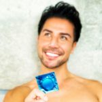 man holding condom