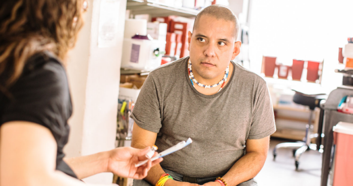 Person receiving Narcan at Harm Reduction Center