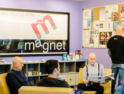 Image of clients in waiting area of Magnet clinic