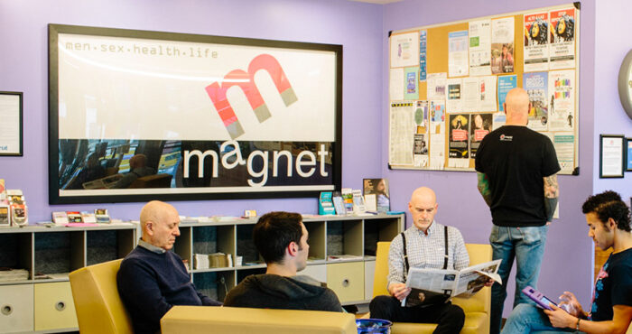 Image of clients in waiting area of Magnet clinic