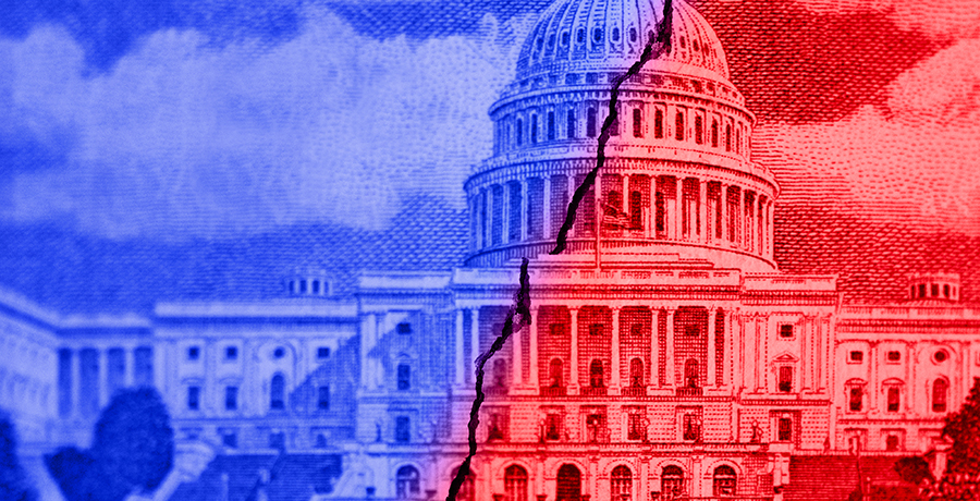 Image of US capitol building, split in half and outlined in red and blue, showing polarized politics in the U.S.